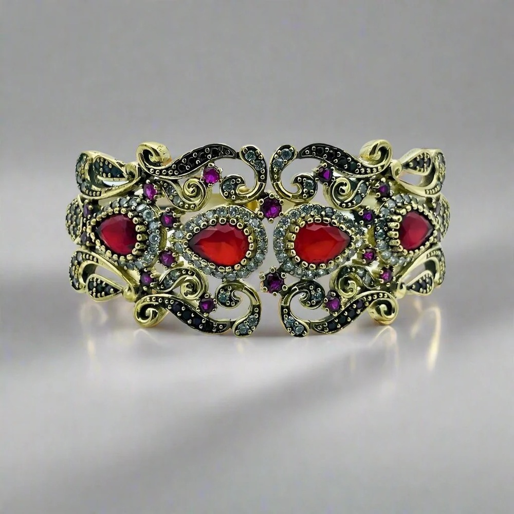 Elegant Gold and Red Bracelet